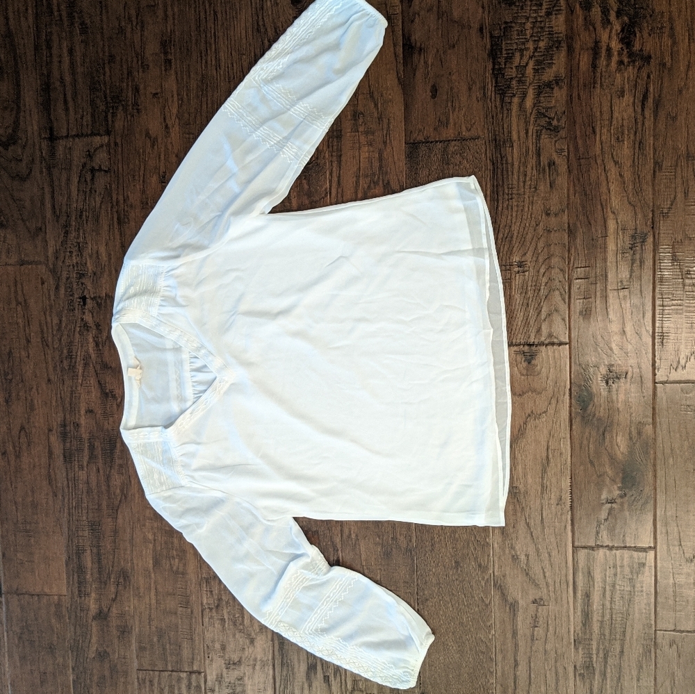White blouse with embroidered detail
